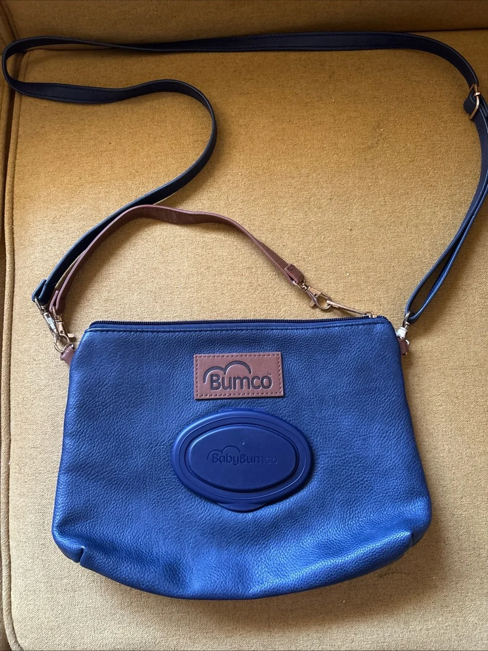 Baby Bumco Vegan Leather Diaper Crossbody/Clutch lightweight baby travel bag.
